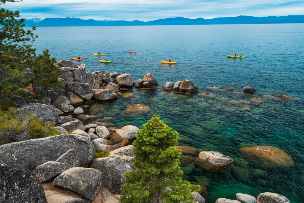 Kayaking in Sand Harbor on Lake Tahoe with turquoise waters